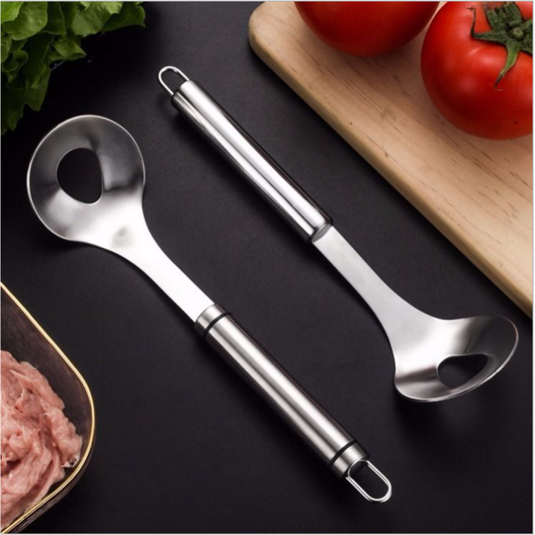 Multi functional spoon. Made from stainless steel and suitable for making meatball