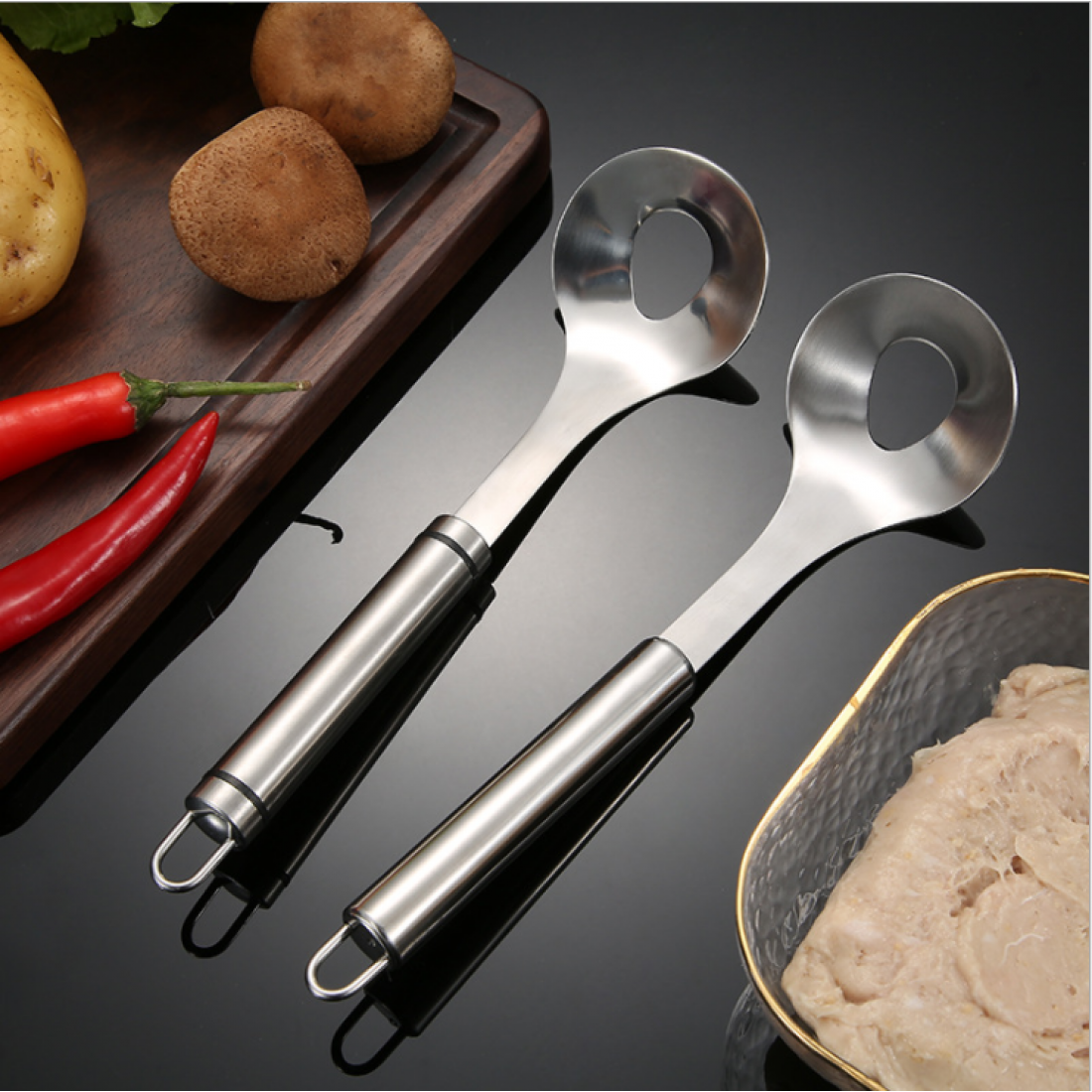 Multi functional spoon. Made from stainless steel and suitable for making meatball